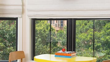 Suite 303 Iconic Corner King | Living area | 43-inch LED TV with digital channels, streaming services