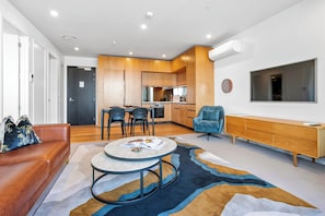 Deluxe Apartment | Living area | 50-inch Smart TV with digital channels, Netflix, streaming services - Beautiful and bold 1 bed retreat (Auckland)