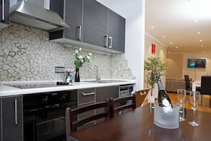 Fridge, microwave, dining tables