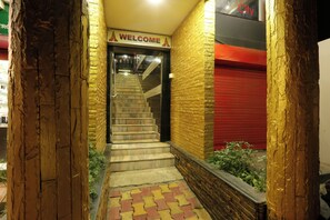 36-inch flat-screen TV with cable channels - Hotel Dream City (Guwahati)