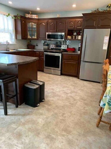 Beautiful split entry home in a wooded paradise!
