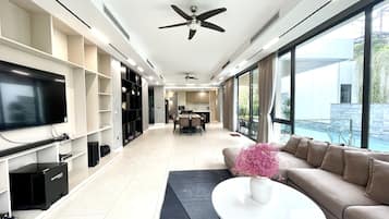Premium Villa, 3 Bedrooms | Living area | 50-inch flat-screen TV with cable channels