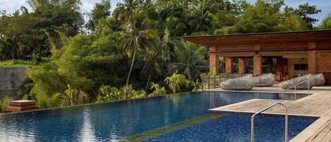 Outdoor pool, pool umbrellas, pool loungers