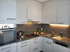 Fridge, oven, dishwasher, high chair