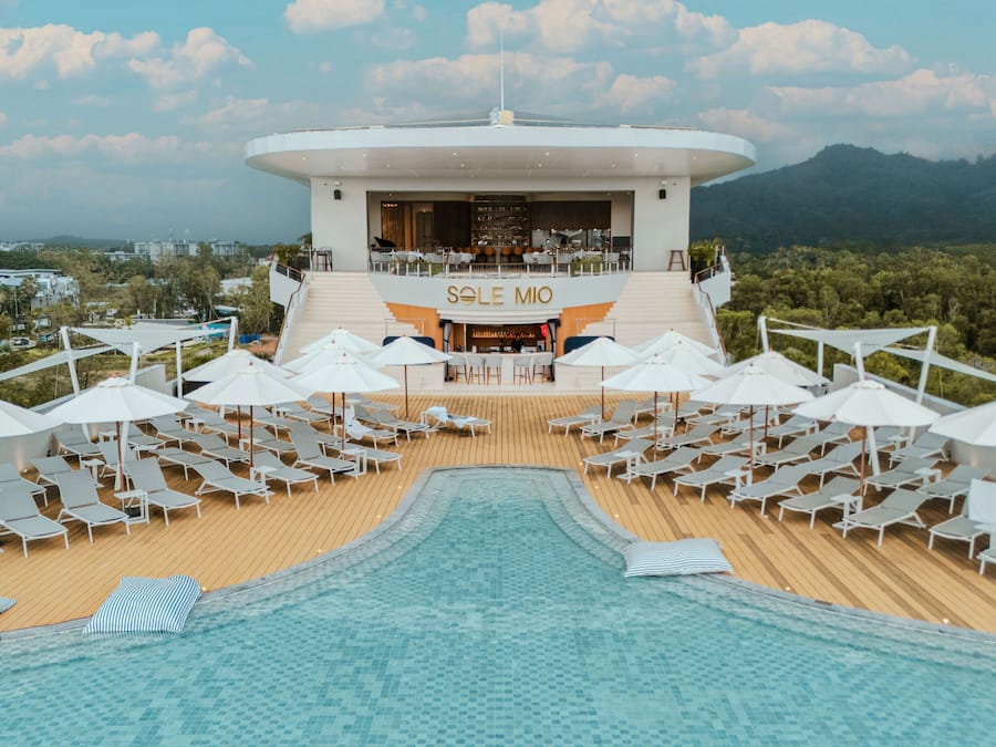 Outdoor pool, open 7:00 AM to 7:00 PM, pool umbrellas, pool loungers