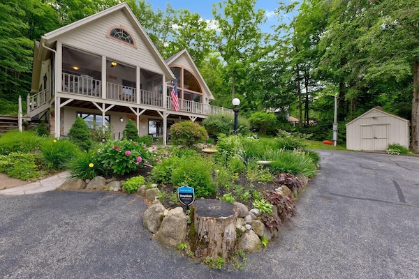 Front of the home and gardens