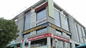 A hotel with multiple floors, including Hotel RK Fortune Rooms and Hotel RK Fortune. - HOTEL R K FORTUNE (Gandhinagar)