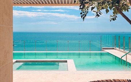 Outdoor pool, open 9:00 AM to 9:00 PM, pool umbrellas, pool loungers