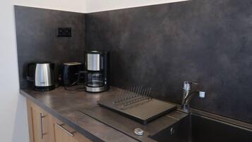 Fridge, dishwasher, toaster, cookware/dishes/utensils