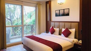 Suíte luxo | 1 quarto, camas com colchões de espuma com sistema de memória, frigobar