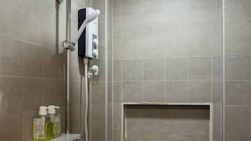 Deluxe Room, 1 Bedroom | Bathroom | Shower, rainfall showerhead, free toiletries, hair dryer