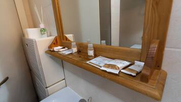 Hair dryer, towels, soap, shampoo