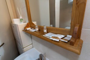 Hair dryer, towels, soap, shampoo