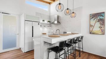 Fridge, microwave, stovetop, coffee/tea maker