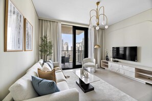 City Apartment | Living room | 55-inch LED TV with cable channels