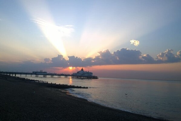 On the beach, sun loungers, beach towels