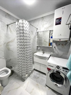 Hair dryer, bidet, towels, soap