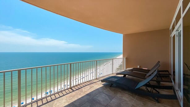 A balcony with a view of the beach and ocean. - Phoenix Orange Beach!  Lazy River and Slide !  New Rental!! (Orange Beach)