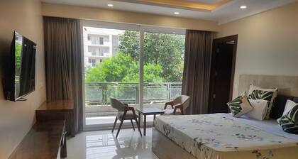 Double Delux Room @ Sterling Room with Balcony Near DLF Cyber City