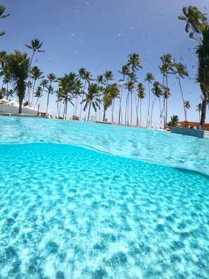 2 indoor pools, open 8:00 AM to 8:00 PM, pool umbrellas, sun loungers
