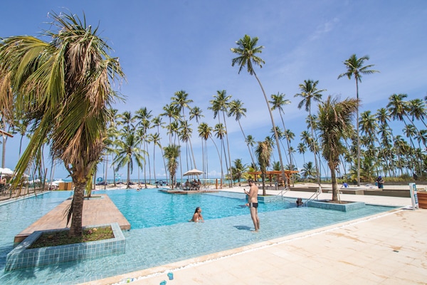 2 indoor pools, open 8:00 AM to 8:00 PM, pool umbrellas, pool loungers