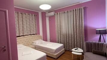 Economy Twin Room, Multiple Beds, Non Smoking, City View | Premium bedding, in-room safe, desk, soundproofing