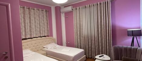 Economy Twin Room, Multiple Beds, Non Smoking, City View | Premium bedding, in-room safe, desk, soundproofing