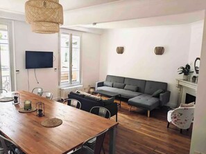 TV, fireplace, books