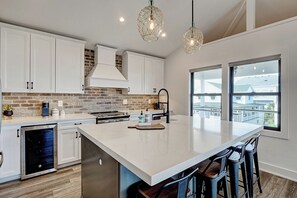 Fridge, microwave, oven, stovetop - Experience Ocean and Pier Views at this Modern Luxury Beach House. (Wrightsville Beach)