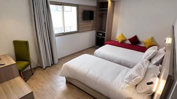 Habitación clásica | Ropa de cama de alta calidad, edredón y camas con pillow-top