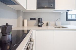 Fridge, microwave, coffee/tea maker, electric kettle
