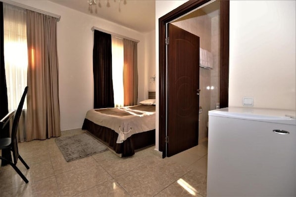 Egyptian cotton sheets, premium bedding, Tempur-Pedic beds, desk