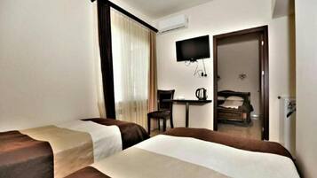 Luxury Suite | Egyptian cotton sheets, premium bedding, Tempur-Pedic beds, desk