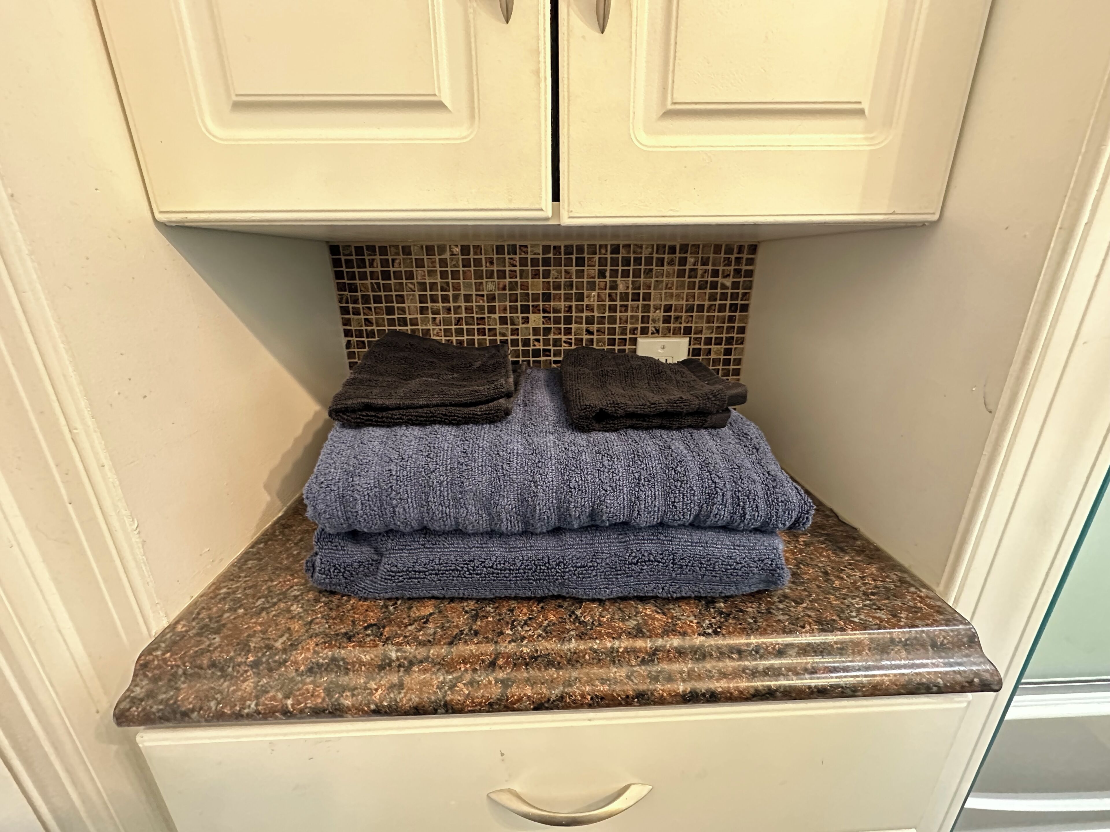 Hair dryer, towels, soap, shampoo