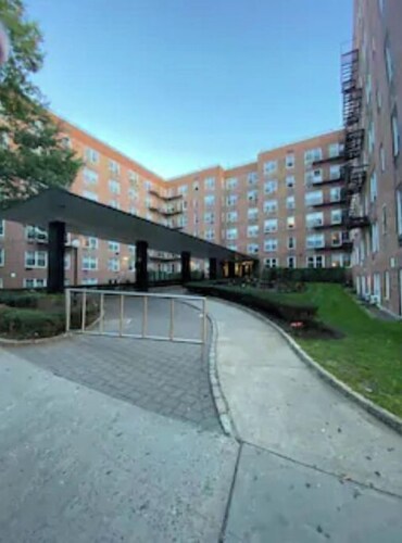 By Main st FlushingLibrary, near Citified & US Open events