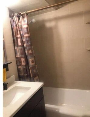 Hair dryer, towels, soap, shampoo