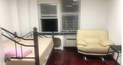 By Main st FlushingLibrary, near Citified & US Open events