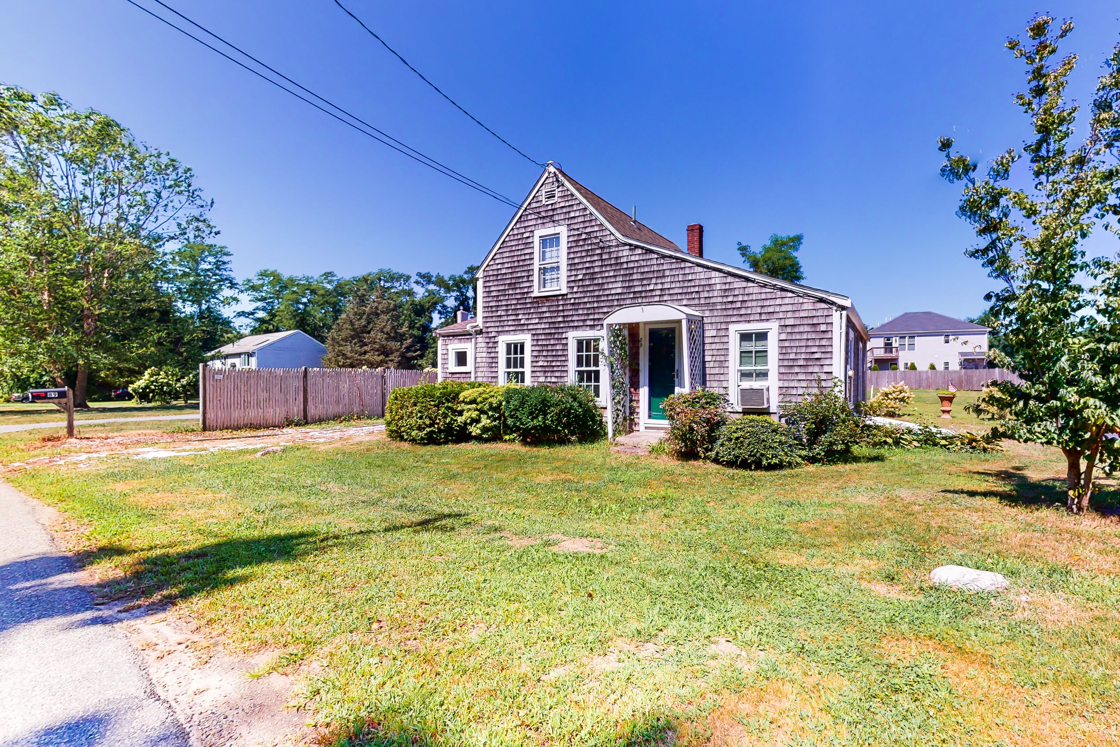 Historic, dog-friendly homestead with a washer/dryer, furnished patio, & yard