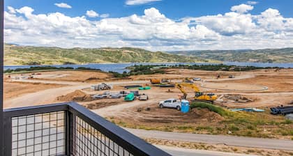 Brand-new top floor condo near Park City with water/mtn views, fireplace, W/D