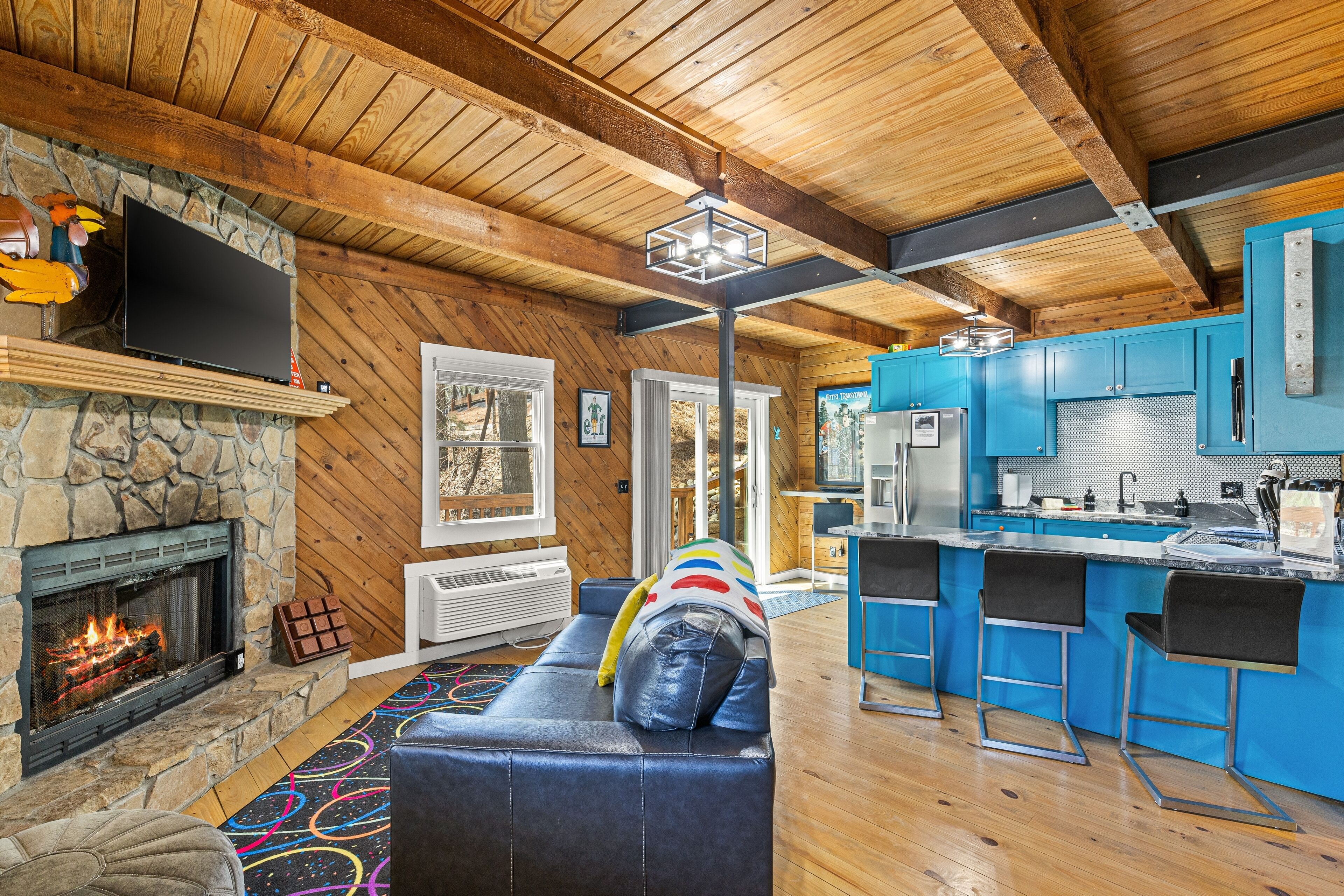 Gaming-themed cabin in Blairsville with arcade consoles & foosball