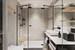 Shower, hair dryer, towels, soap