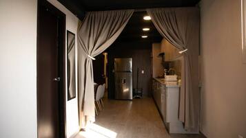 Fridge, microwave, stovetop, coffee/tea maker