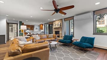 Smart TV, fireplace, books, stereo