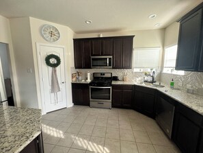 Private kitchen - Modern Escape, with a pet and family friendly home that feels like a home. (Pattison)