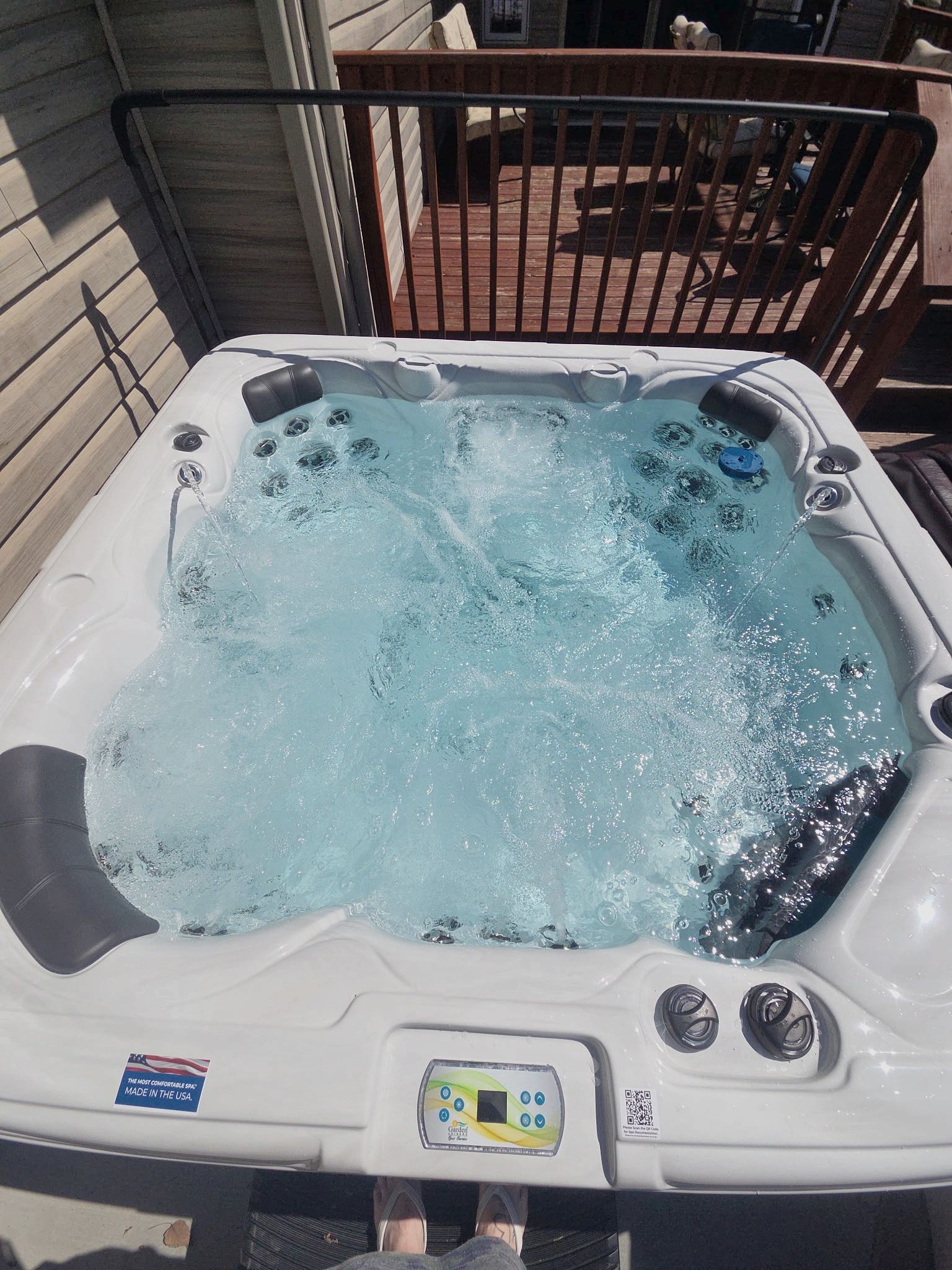 Private bubbling hot tub on the deck for the ultimate relaxing getaway