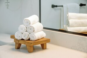 Hair dryer, towels, soap, shampoo