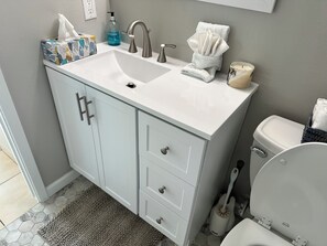 Hair dryer, towels, soap, shampoo