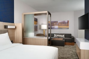 Hypo-allergenic bedding, desk, laptop workspace, blackout curtains