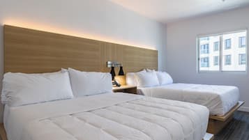 Deluxe Room, 2 Queen Beds, Non Smoking | Hypo-allergenic bedding, memory-foam beds, in-room safe, desk