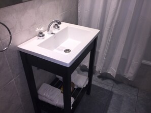 Hair dryer, towels, soap, toilet paper